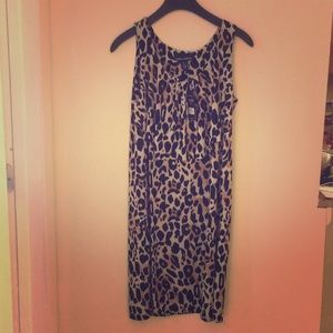 An Knee length leopard print dress.